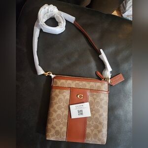 Medium sized Brown Coach purse.